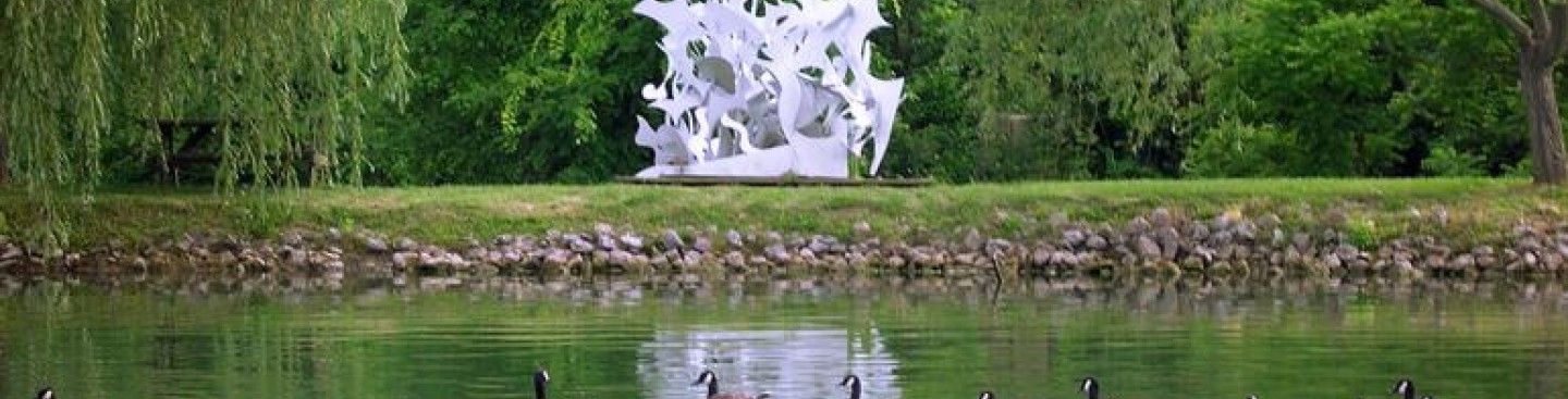 Image of a sculpture at Pyramid Hill visible from across a body of water