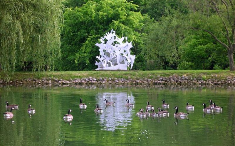 Image of a sculpture at Pyramid Hill visible from across a body of water