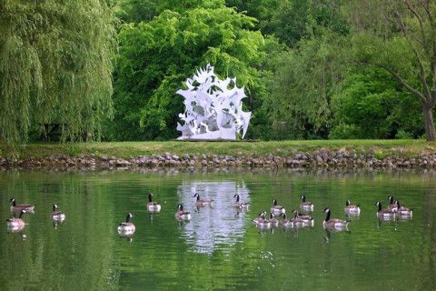 Image of a sculpture at Pyramid Hill visible from across a body of water