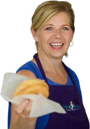 Woman Handing Out Donut